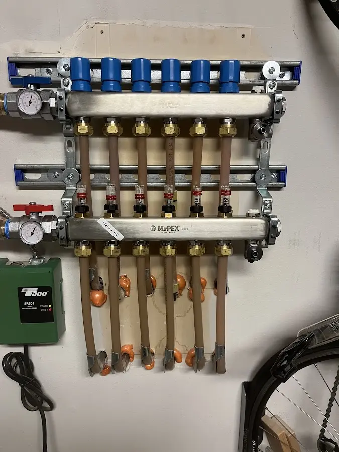 Plumber performing Gas Leak Detection at a residential property in Lake Grove